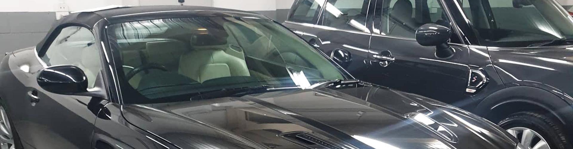 car window replacement service close-up technician working