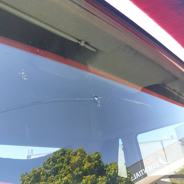 damaged car window glass before repair