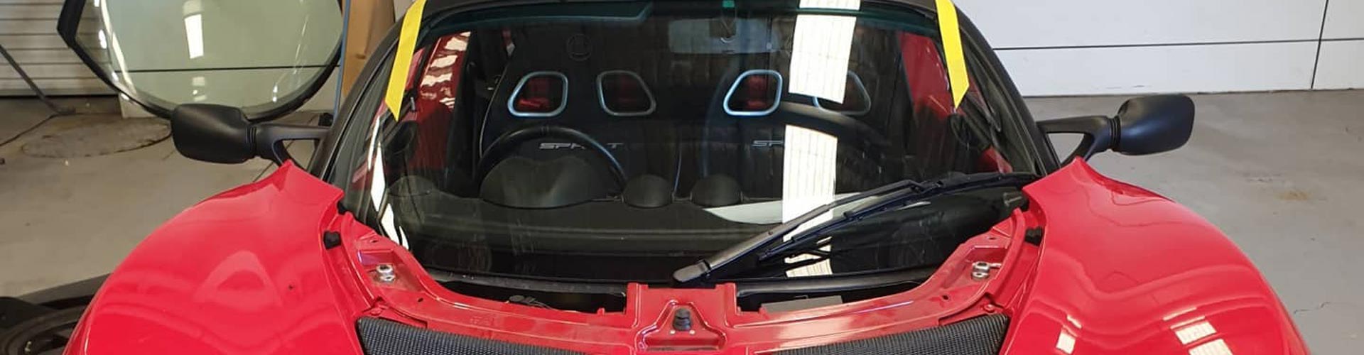 car window replacement service close-up technician working