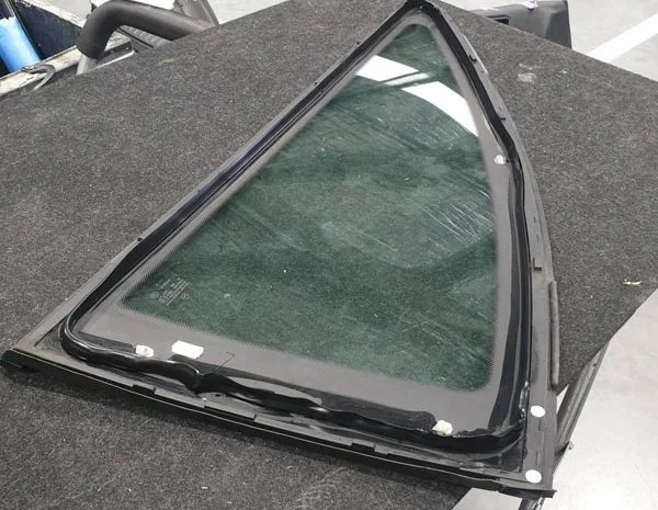 damaged car window glass before repair