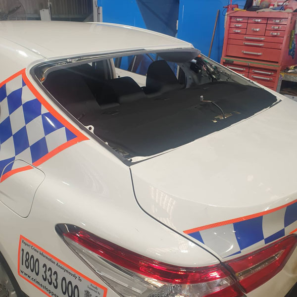 damaged car window glass before repair