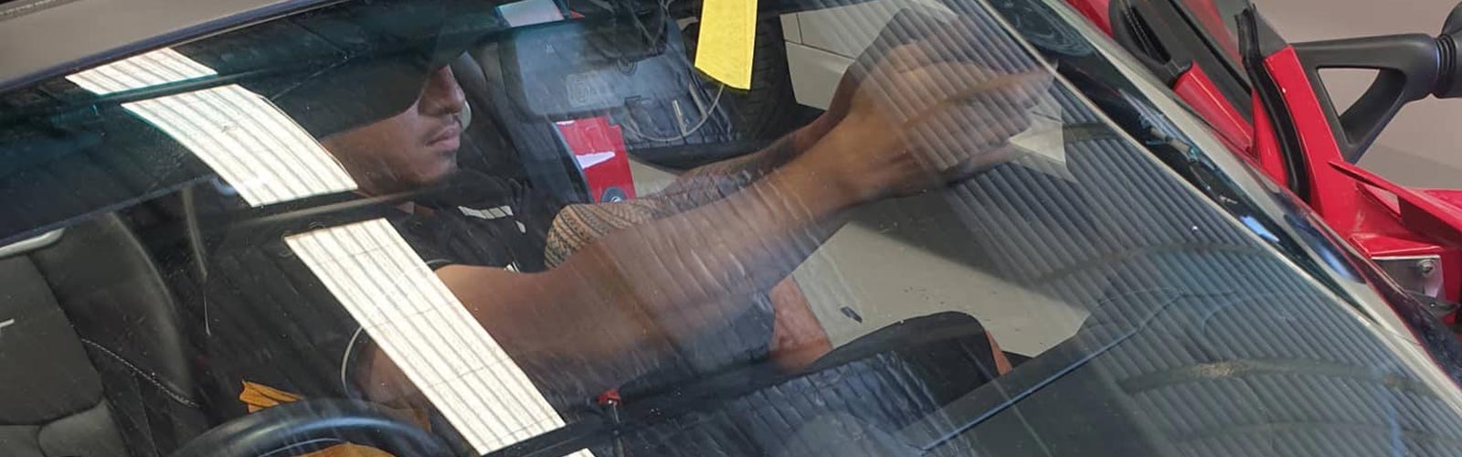 car window replacement service close-up technician working